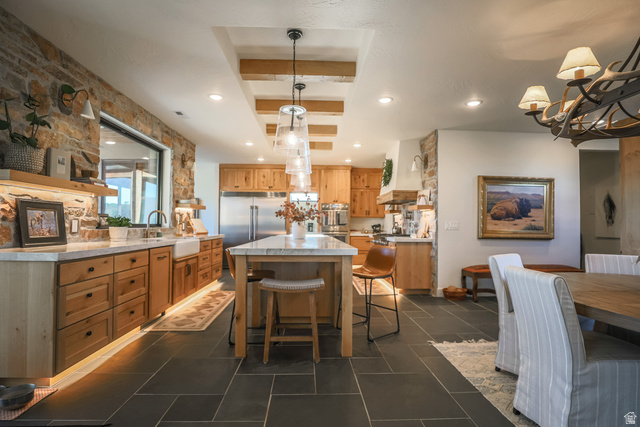 6688 Bareback Road Cedar City, UT 84720 - Photo 14 of 58 Kitchen with stainless steel built in fridge, a center island, open shelves,