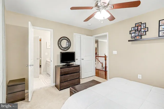 a view of a livingroom with furniture and a window