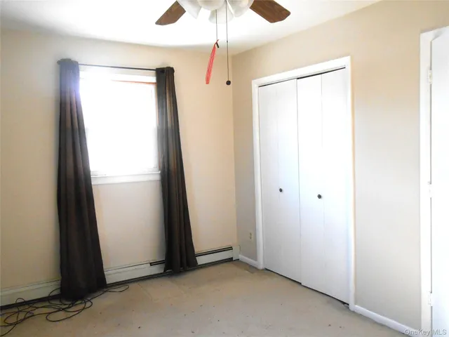 a view of swimming pool with a backyard