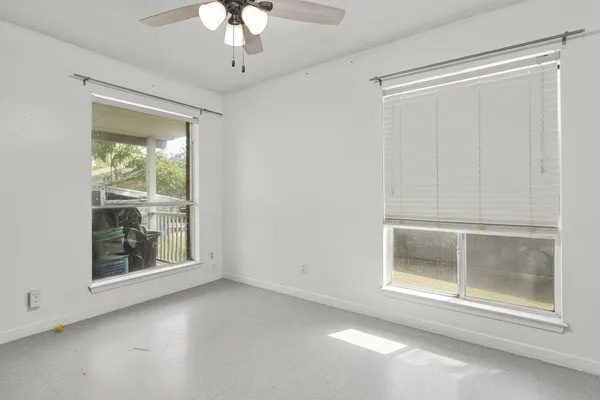 a view of a room that has a large window