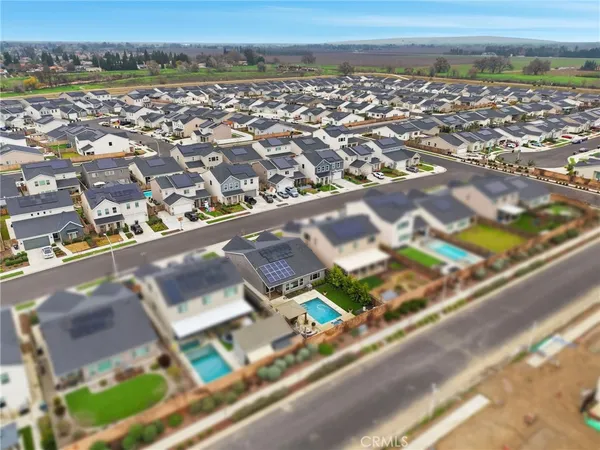 an aerial view of residential building and street