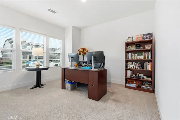 a room with furniture and window