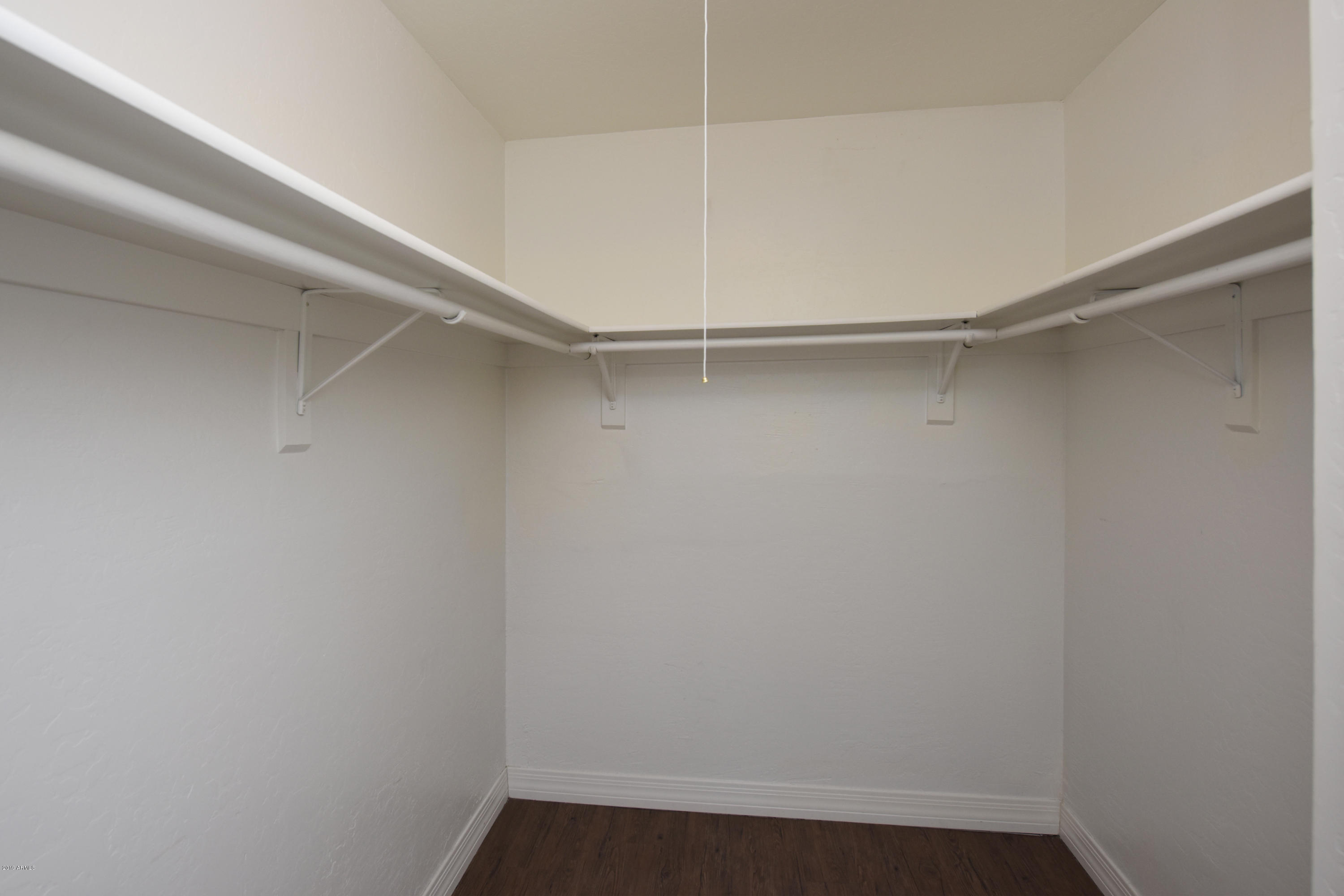 502 East Mariposa Street, Unit 101 Phoenix, AZ 85012 - Photo 16 of 24 a view of an empty walk in closet