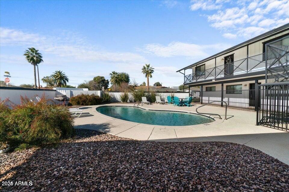 502 East Mariposa Street, Unit 101 Phoenix, AZ 85012 - Photo 2 of 24 a view of a house with a swimming pool
