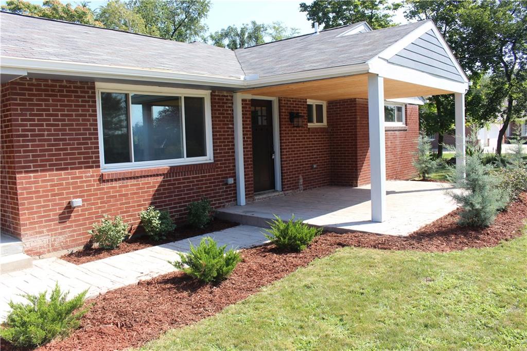 236 McCoy Place Road Sewickley, PA 15143 - Photo 18 of 19 New walkway and patio, dimensional roof, doors, windows and fresh landscaping!