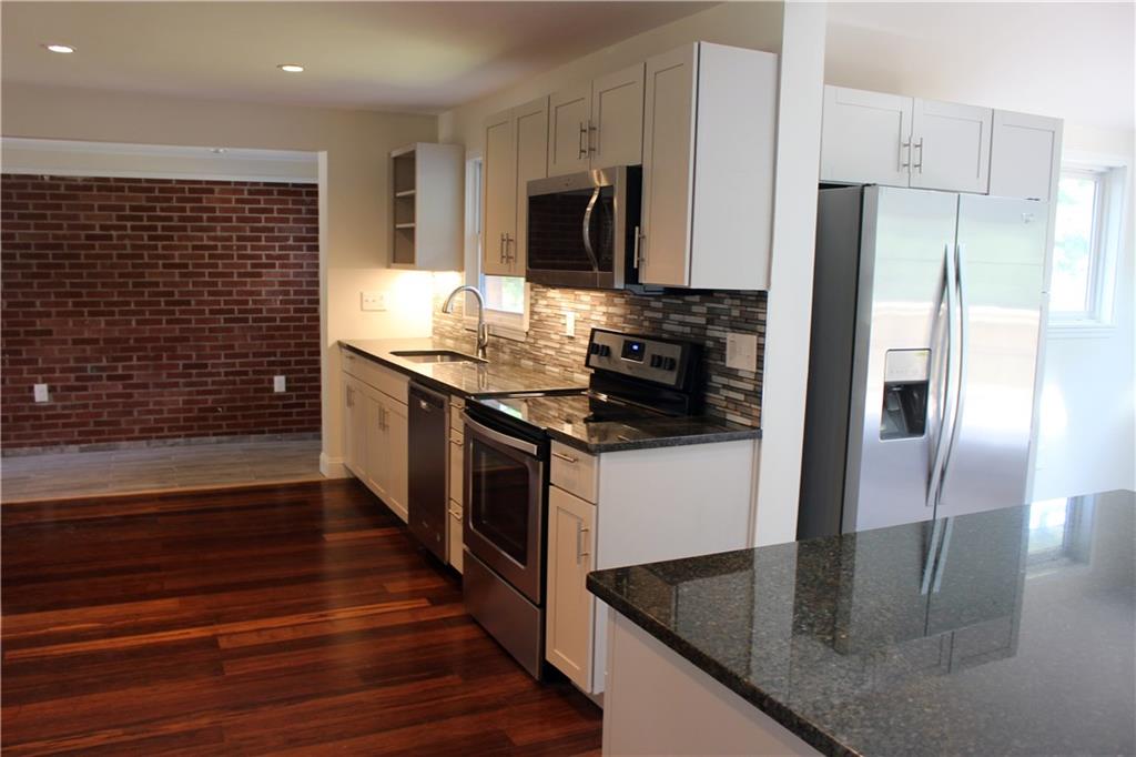 236 McCoy Place Road Sewickley, PA 15143 - Photo 3 of 19 View through the kitchen and into the entry way.