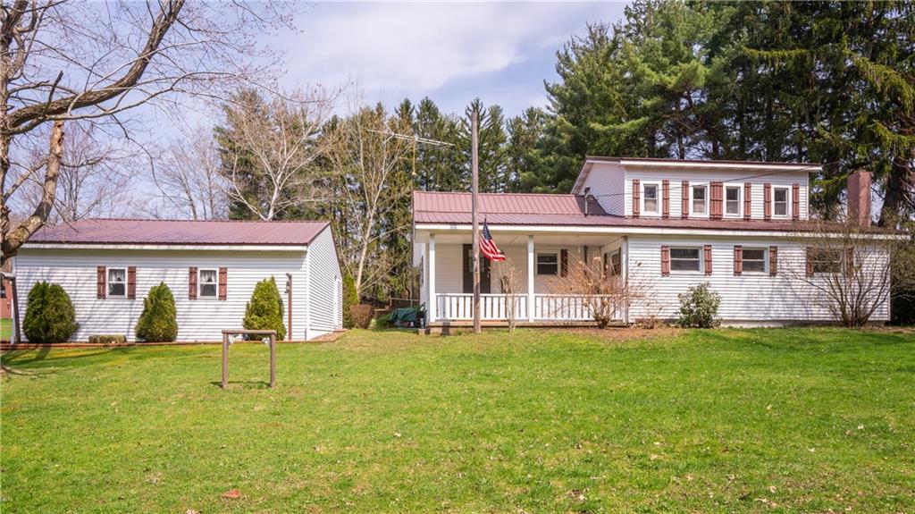 186 Hovis Road Polk, PA 16342 - Photo 3 of 25 New metal roof and an oversized two car garage!!