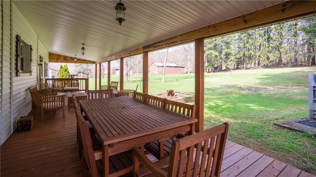 186 Hovis Road Polk, PA 16342 - Photo 22 of 25 This back deck overlooking the private backyard is worth the price of the house! Tranquil way to come home and relax.
