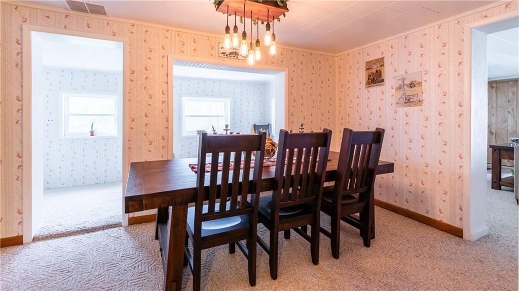 186 Hovis Road Polk, PA 16342 - Photo 8 of 25 The 14x9 dining room opens to the sunroom