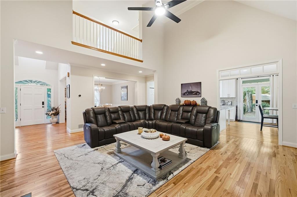320 Allendale Drive Canton, GA 30115 - Photo 13 of 70 a living room with furniture and a wooden floor