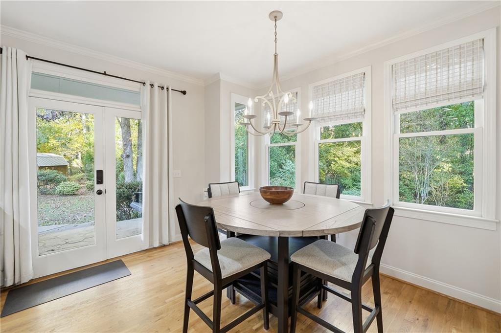 320 Allendale Drive Canton, GA 30115 - Photo 23 of 70 a view of a dining room with furniture wooden floor and chandelier