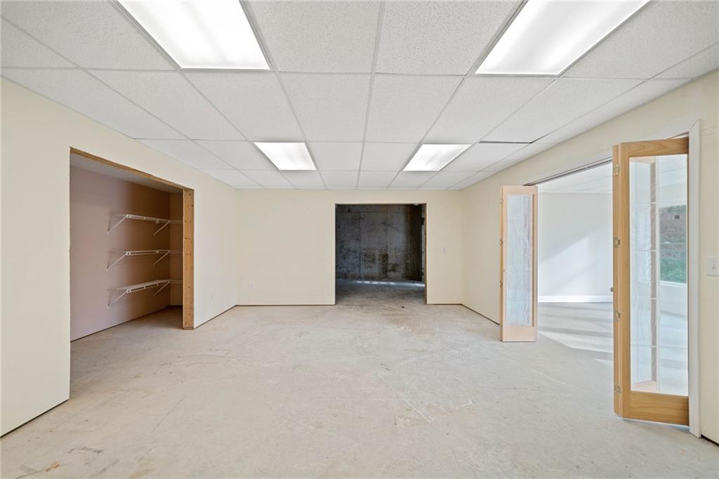 320 Allendale Drive Canton, GA 30115 - Photo 60 of 70 an empty room with closet and windows