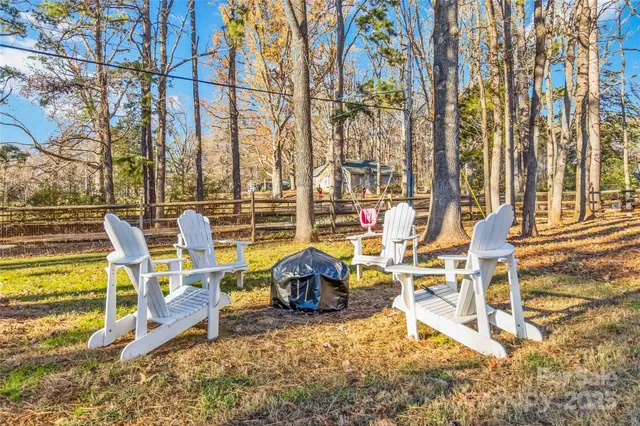 a view of a chairs and table on the terrace