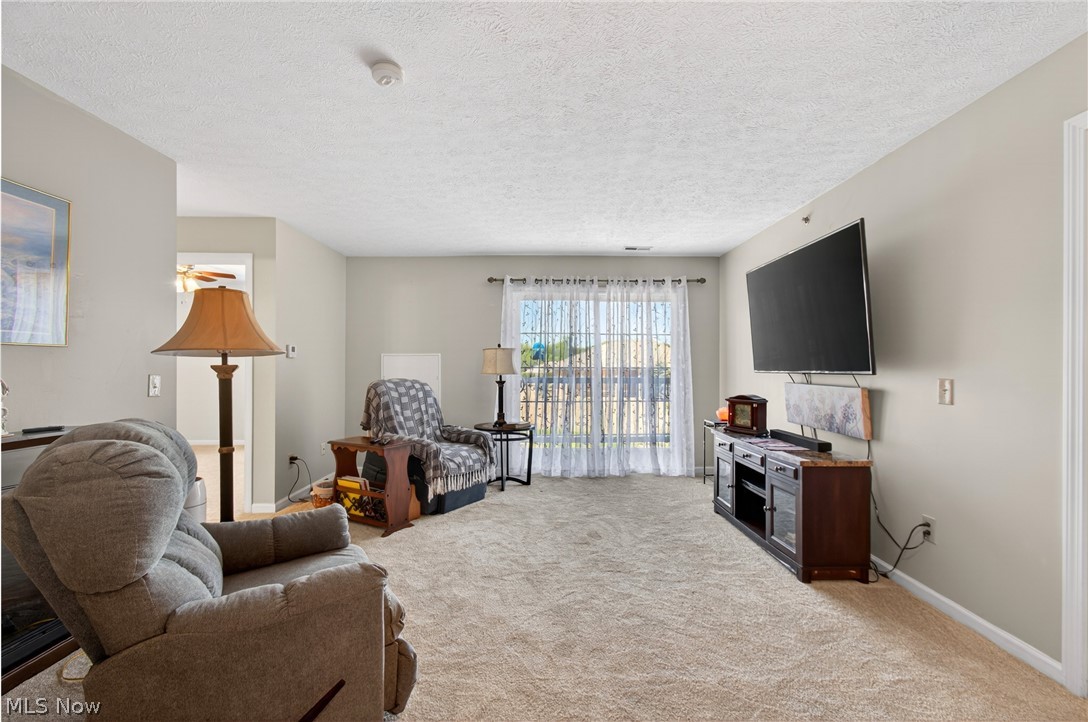 4703 Hills And Dales Road Northwest Canton, OH 44708 - Photo 3 of 25 Bright living room with natural light