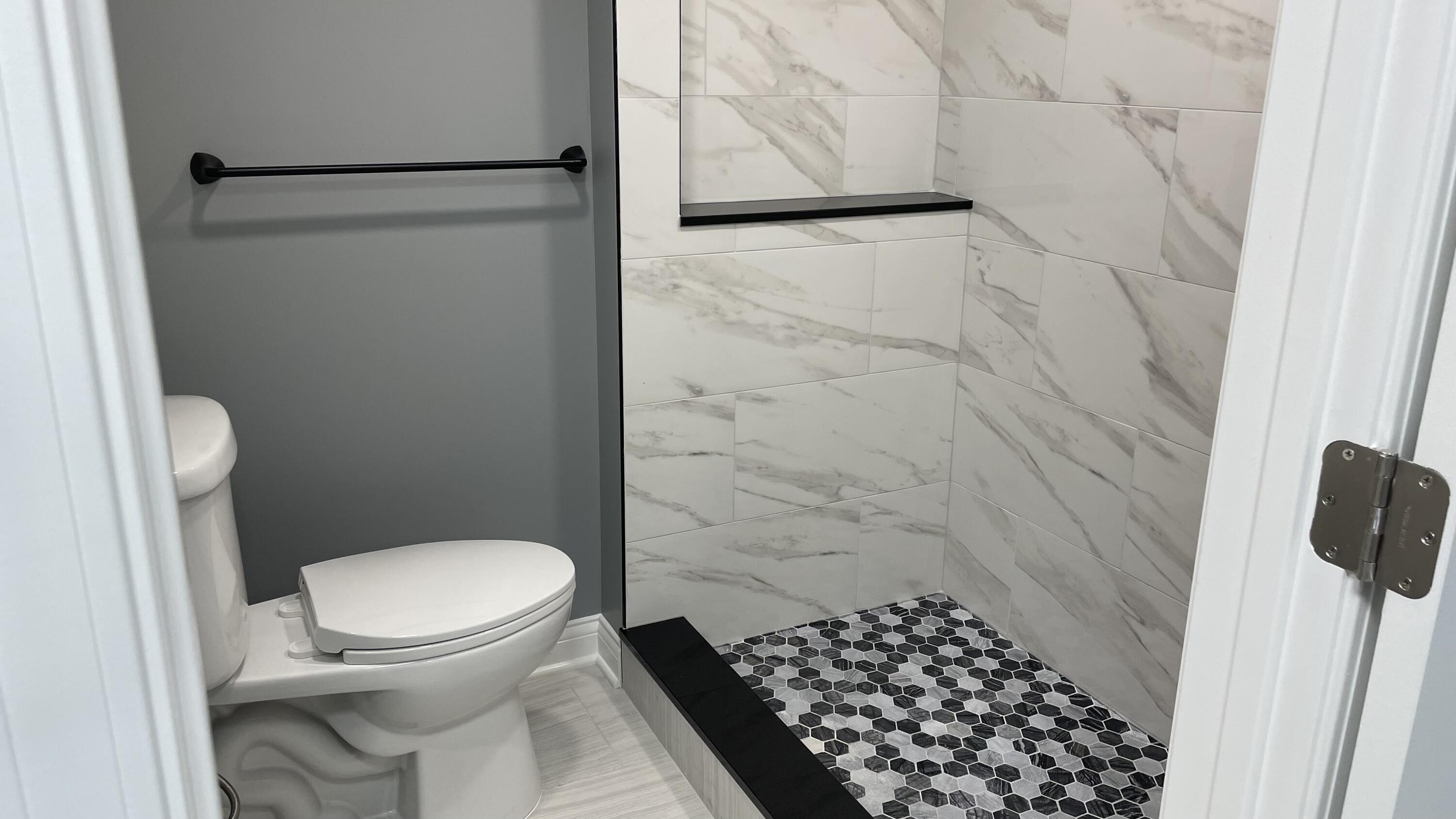 3362 Virginia Street Gary, IN 46409 - Photo 13 of 29 a bathroom with a toilet and a shower