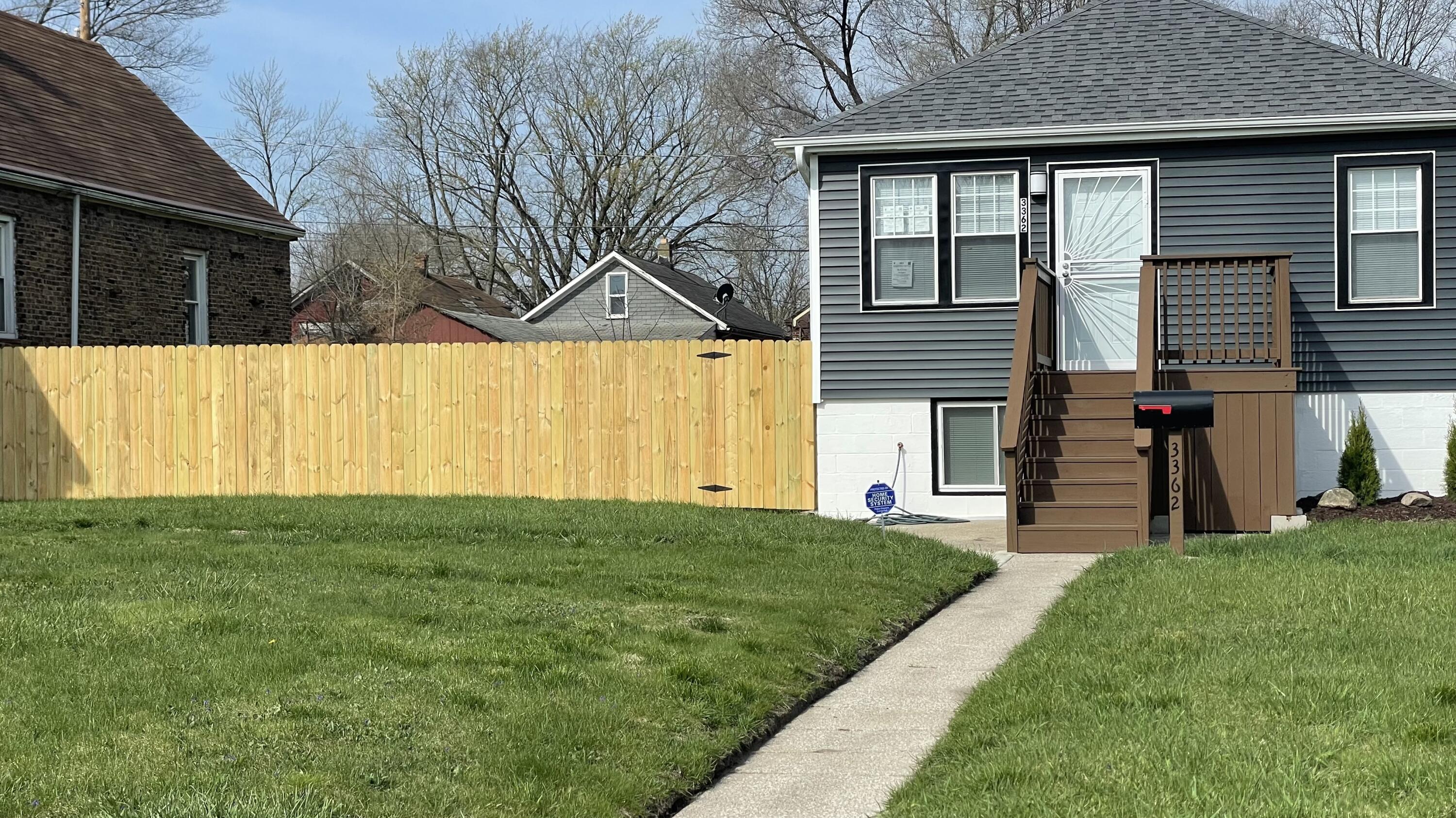 3362 Virginia Street Gary, IN 46409 - Photo 3 of 29 a view of a house with a backyard