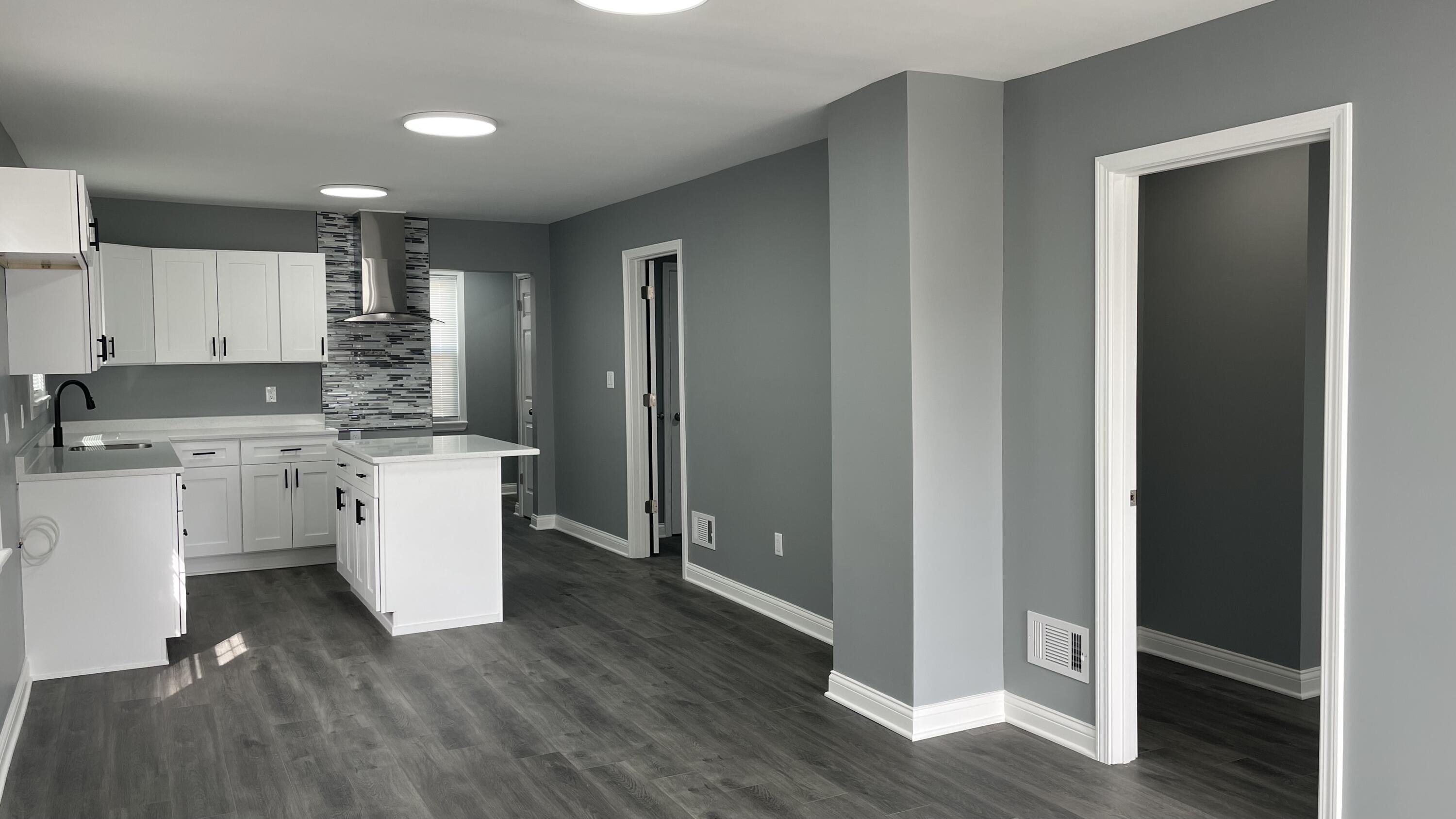 3362 Virginia Street Gary, IN 46409 - Photo 5 of 29 a view of kitchen with wooden floor
