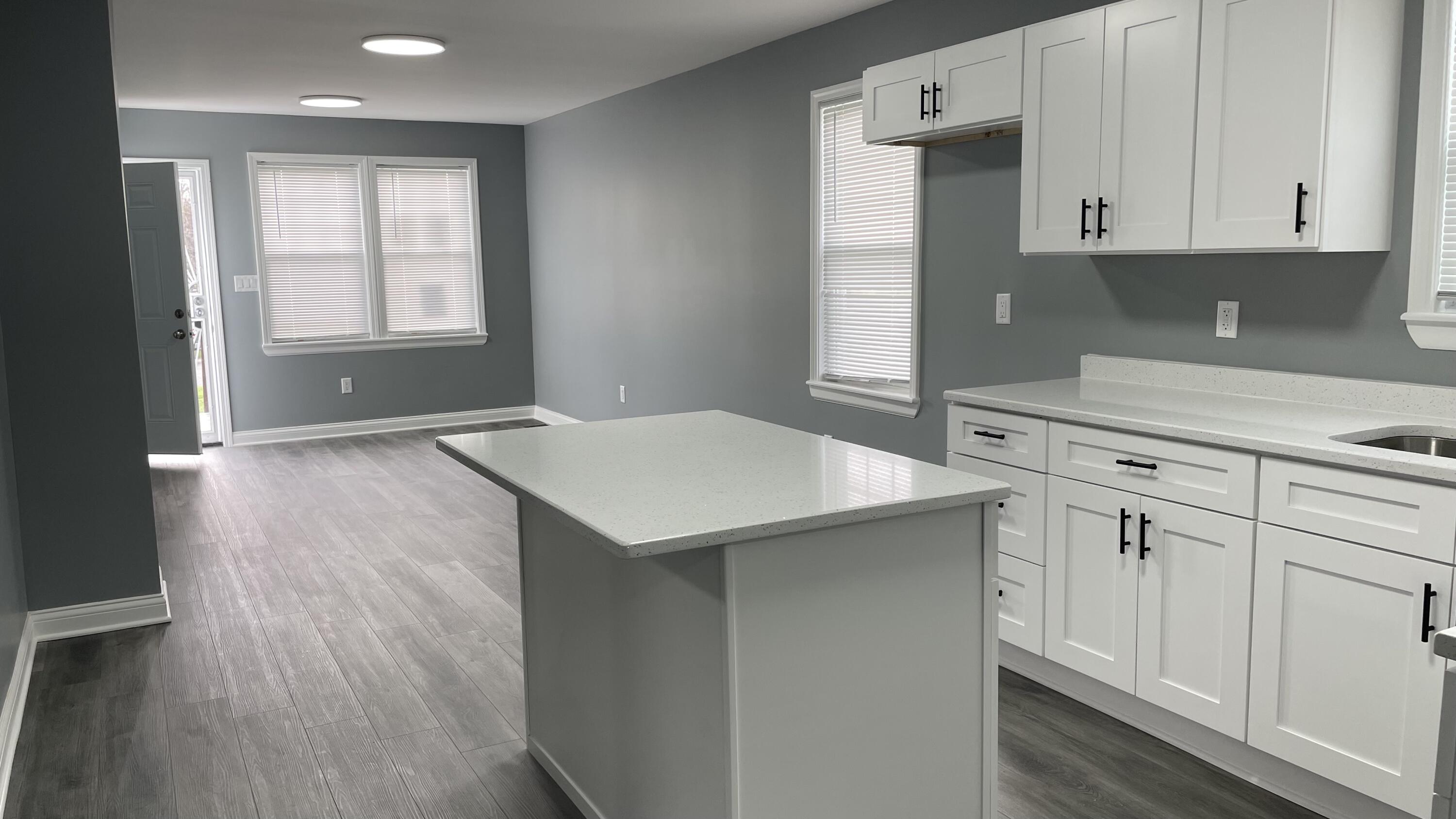 3362 Virginia Street Gary, IN 46409 - Photo 7 of 29 a kitchen with cabinets appliances and a window