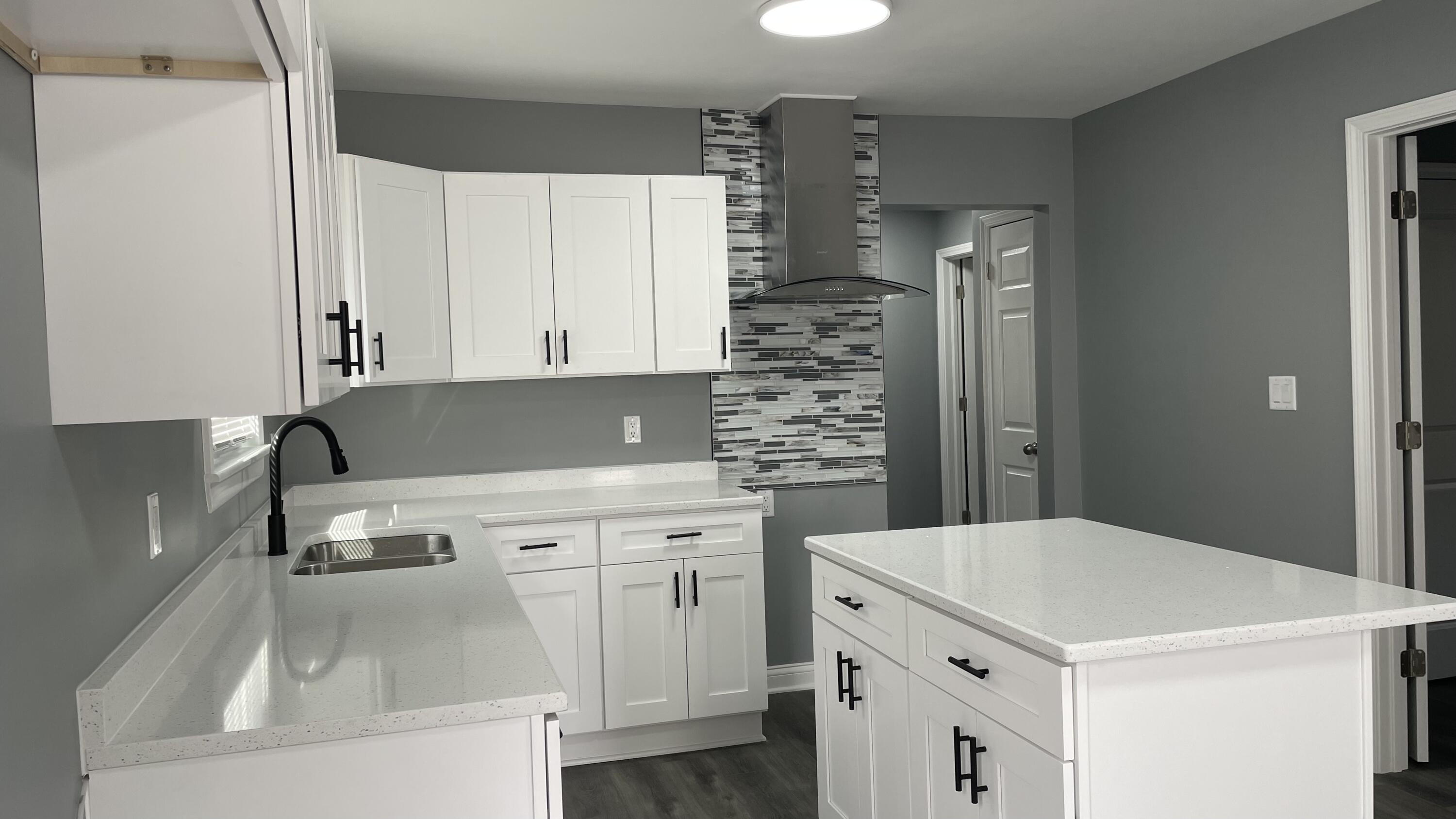 3362 Virginia Street Gary, IN 46409 - Photo 9 of 29 a kitchen with a sink stove and cabinets