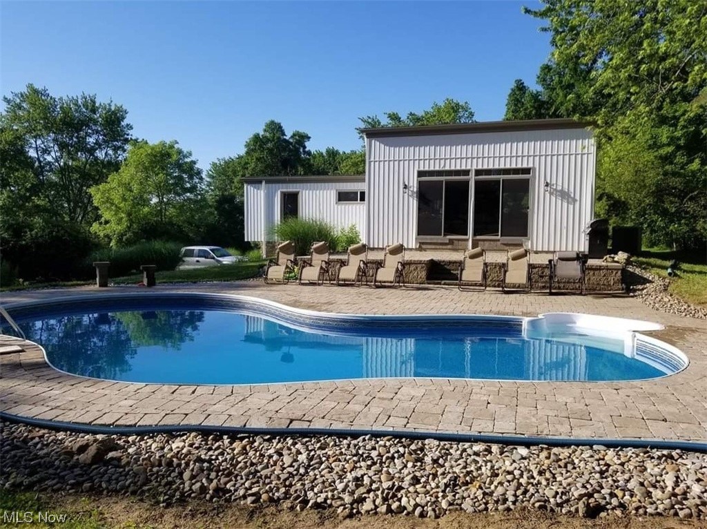 3061 Sandy Lake Road Ravenna, OH 44266 - Photo 15 of 15 View of pool with a patio area