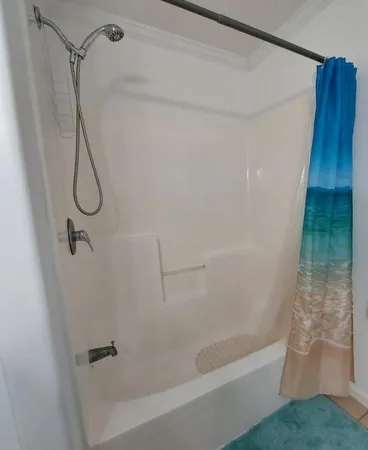 a bathroom with a bath tub