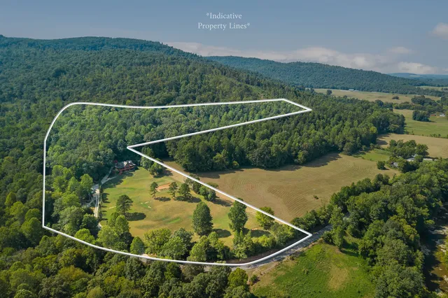 a view of balcony with wooden floor and fence