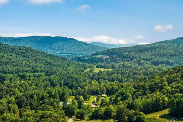 a view of an chairs and tables in the patio