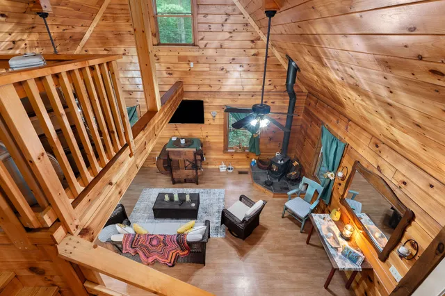 a view of an chairs and tables in the balcony