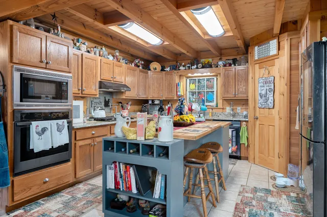 a bedroom with bed and window