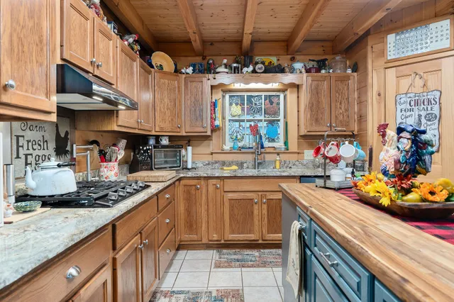 a bed room with a bed and a television