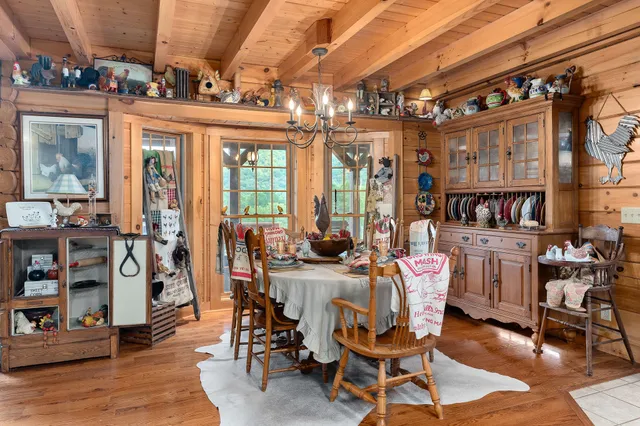 a living room with furniture fireplace and flat screen tv