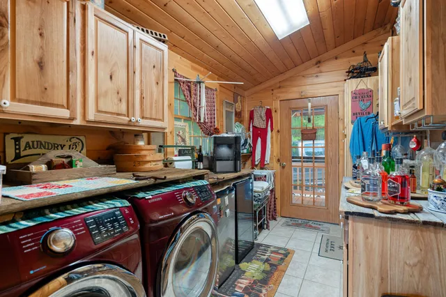 a room with furniture and a large window