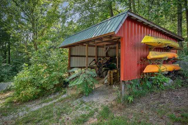 a backyard of a house with lots of green space