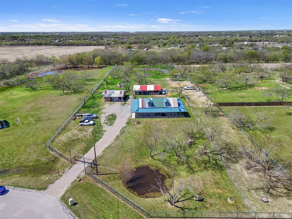 1556 John Wayne Road Kaufman, TX 75142 - Photo 2 of 33 a view of a lake in middle of the town