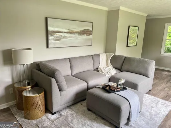 a living room with furniture and a couch