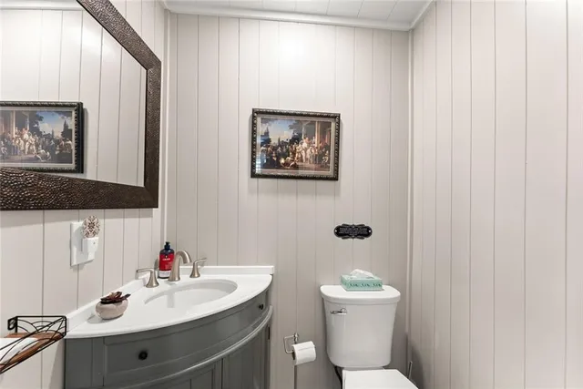 a bathroom with a shower curtain and a window