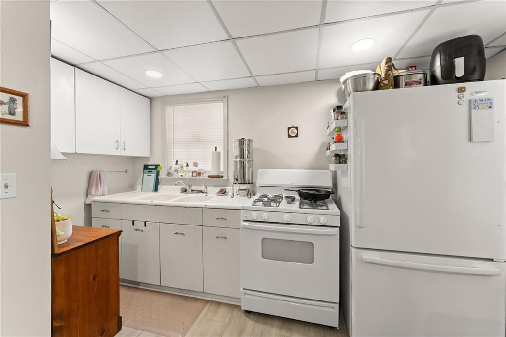 168 West Main Street Dahlonega, GA 30533 - Photo 83 of 118 a kitchen with a sink a stove and cabinets