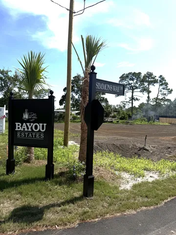 a view of a street with a park