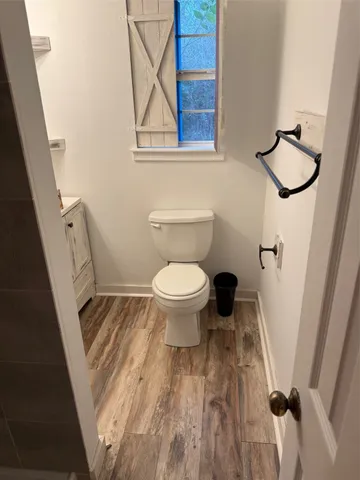 a bathroom with a toilet and a sink