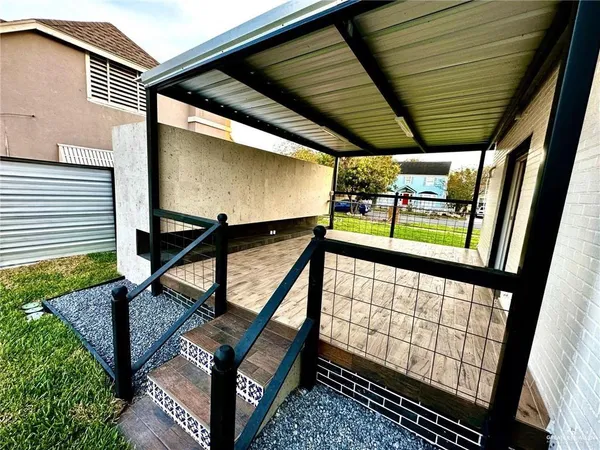 a view of stairs and yard