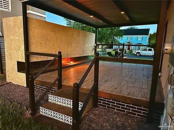 a view of a house with yard and a garden