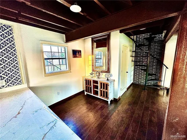 a view of livingroom with furniture and wooden floor