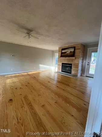 a view of a livingroom with wooden floor