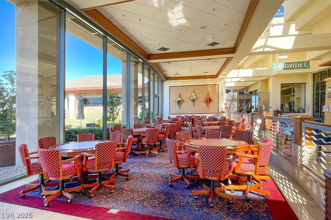 1823 Baton Rouge Street Henderson, NV 89052 - Photo 46 of 60 Towering floor-to-ceiling windows and tray ceilings define this expansive community recreation space.