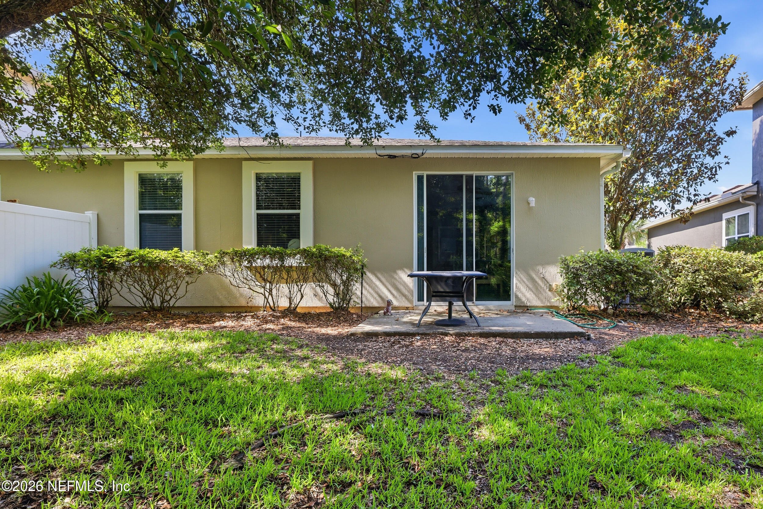 3260 Chestnut Ridge Way Orange Park, FL 32065 - Photo 23 of 39 a front view of a house with garden
