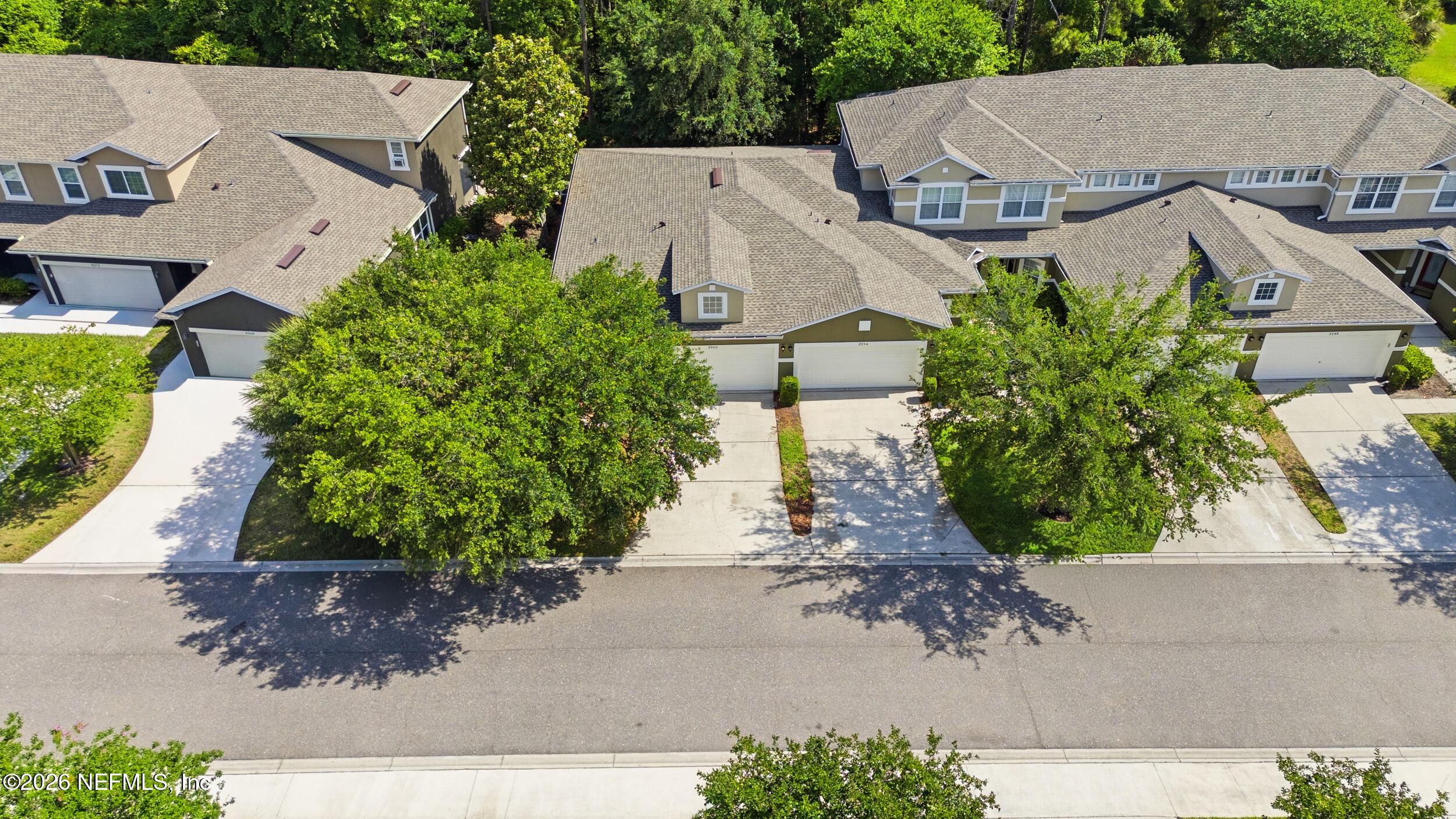 3260 Chestnut Ridge Way Orange Park, FL 32065 - Photo 26 of 39 an aerial view of a house with garden space and street view
