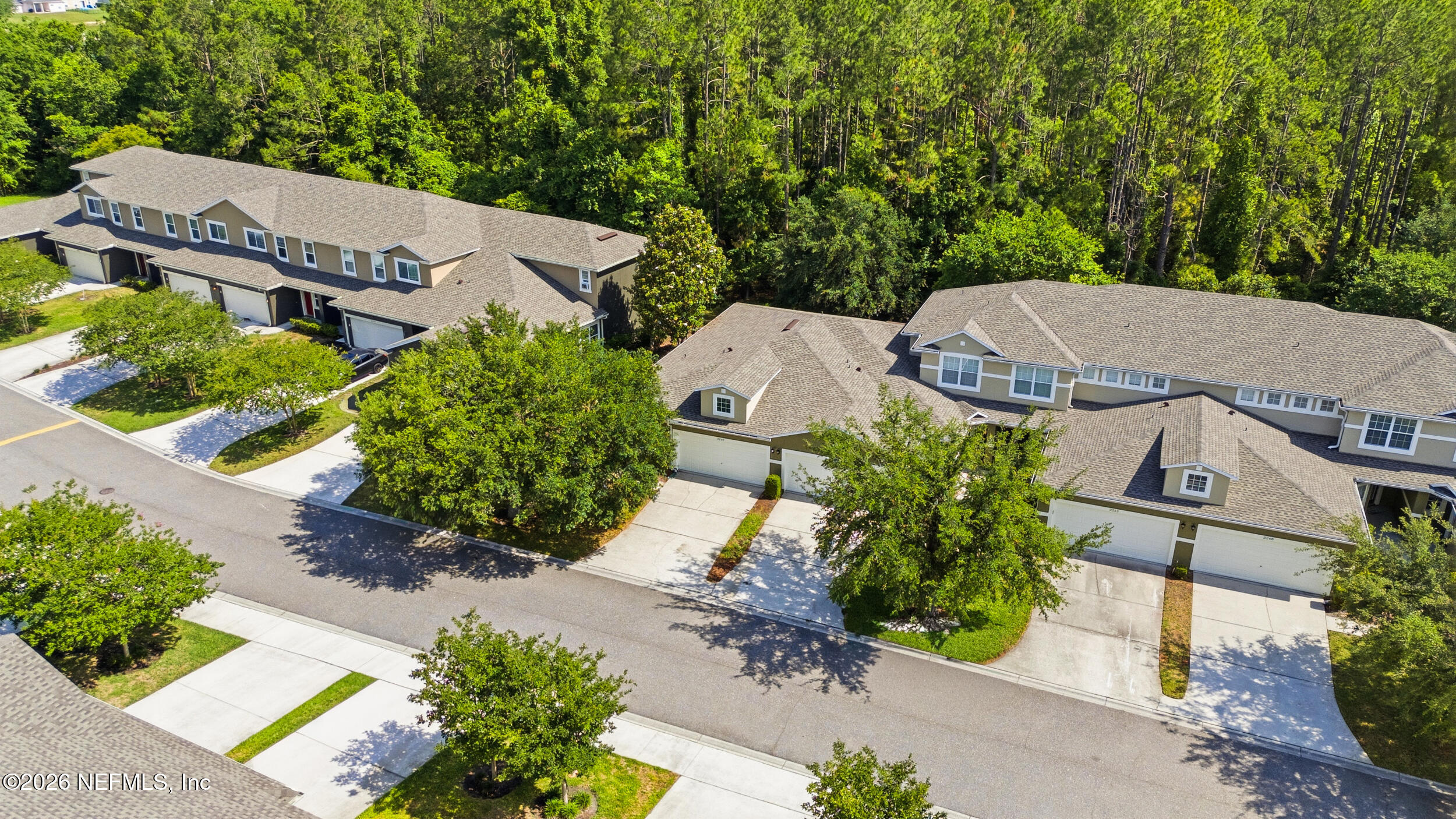 3260 Chestnut Ridge Way Orange Park, FL 32065 - Photo 27 of 39 an aerial view of a house with a garden