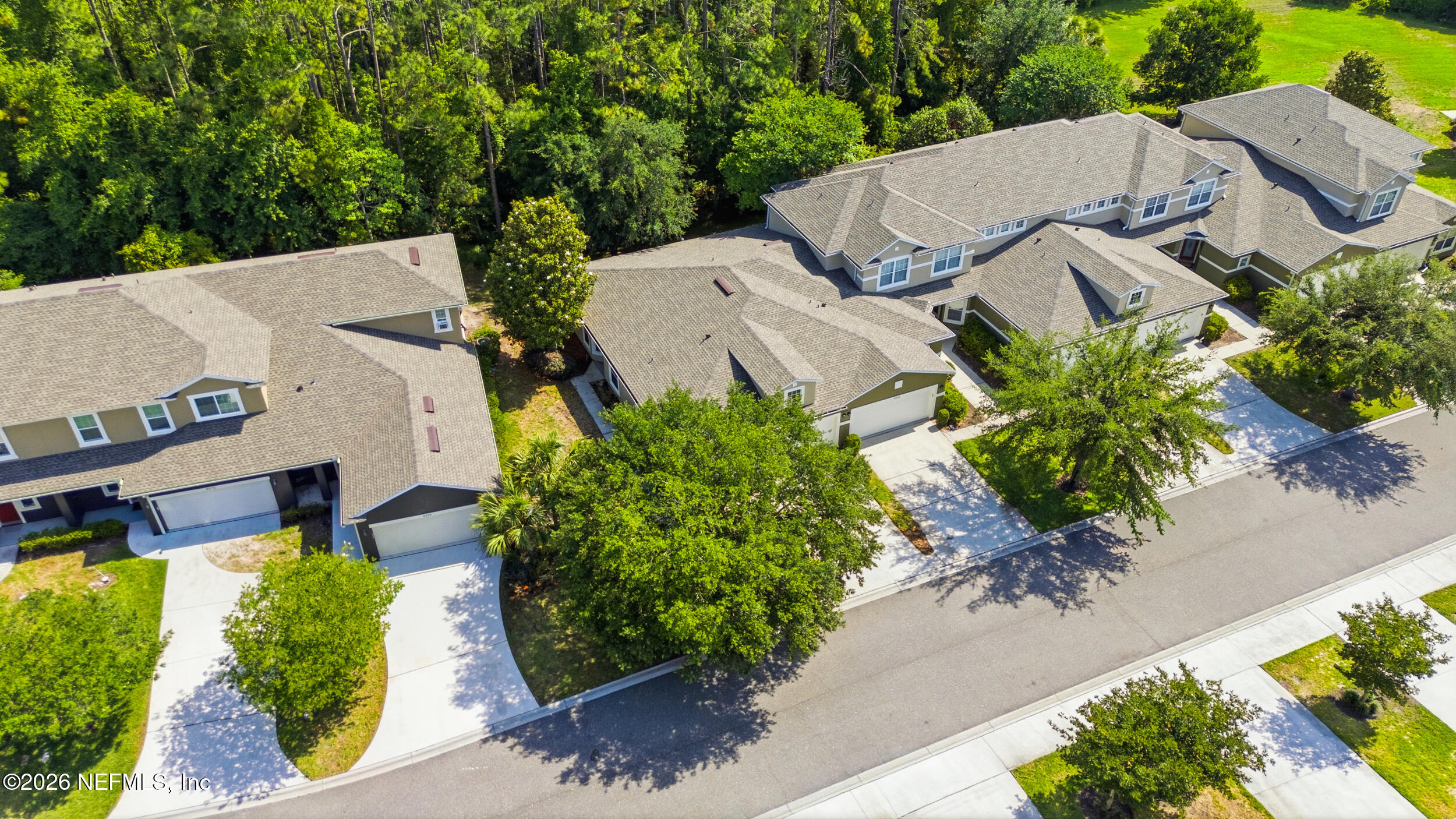 3260 Chestnut Ridge Way Orange Park, FL 32065 - Photo 28 of 39 an aerial view of a house with a yard