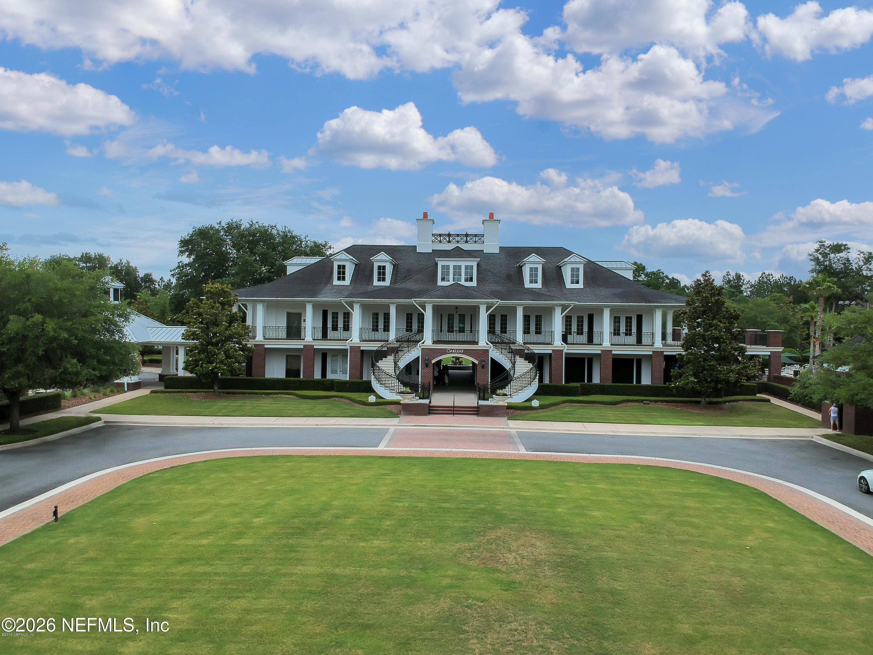 3260 Chestnut Ridge Way Orange Park, FL 32065 - Photo 33 of 39 a front view of a house with garden