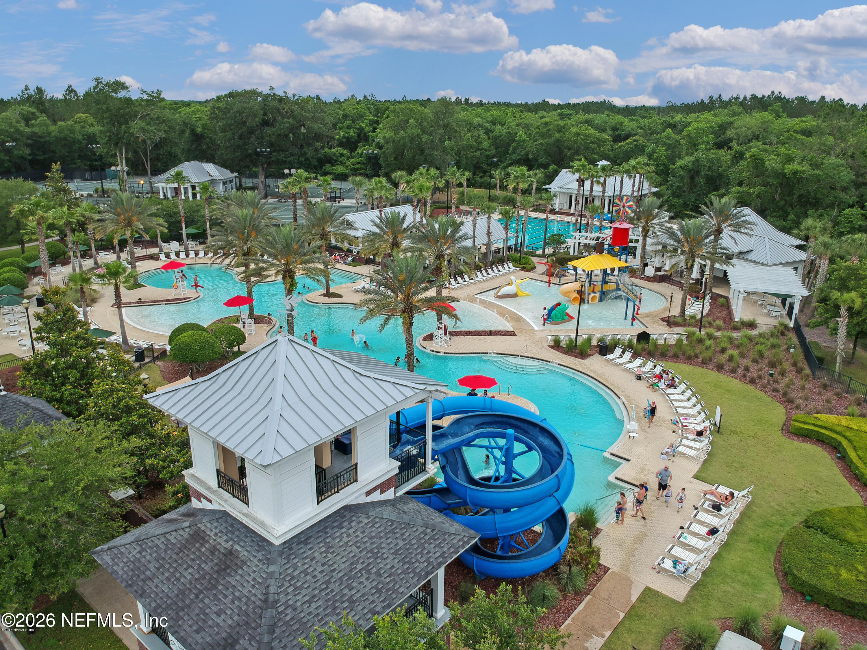 3260 Chestnut Ridge Way Orange Park, FL 32065 - Photo 34 of 39 an aerial view of a swimming pool patio and outdoor seating